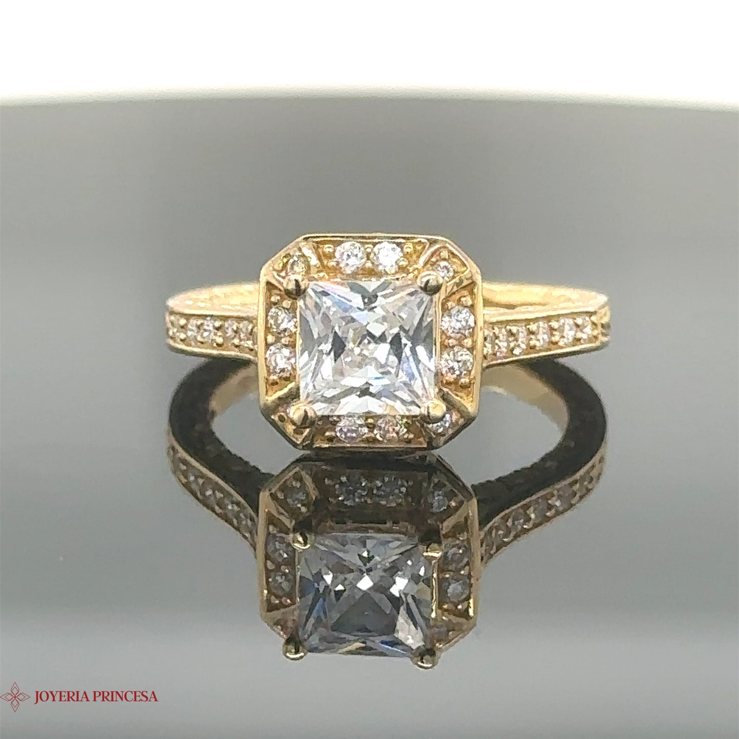 Anillo de compromiso con circonita cuadrada 14K