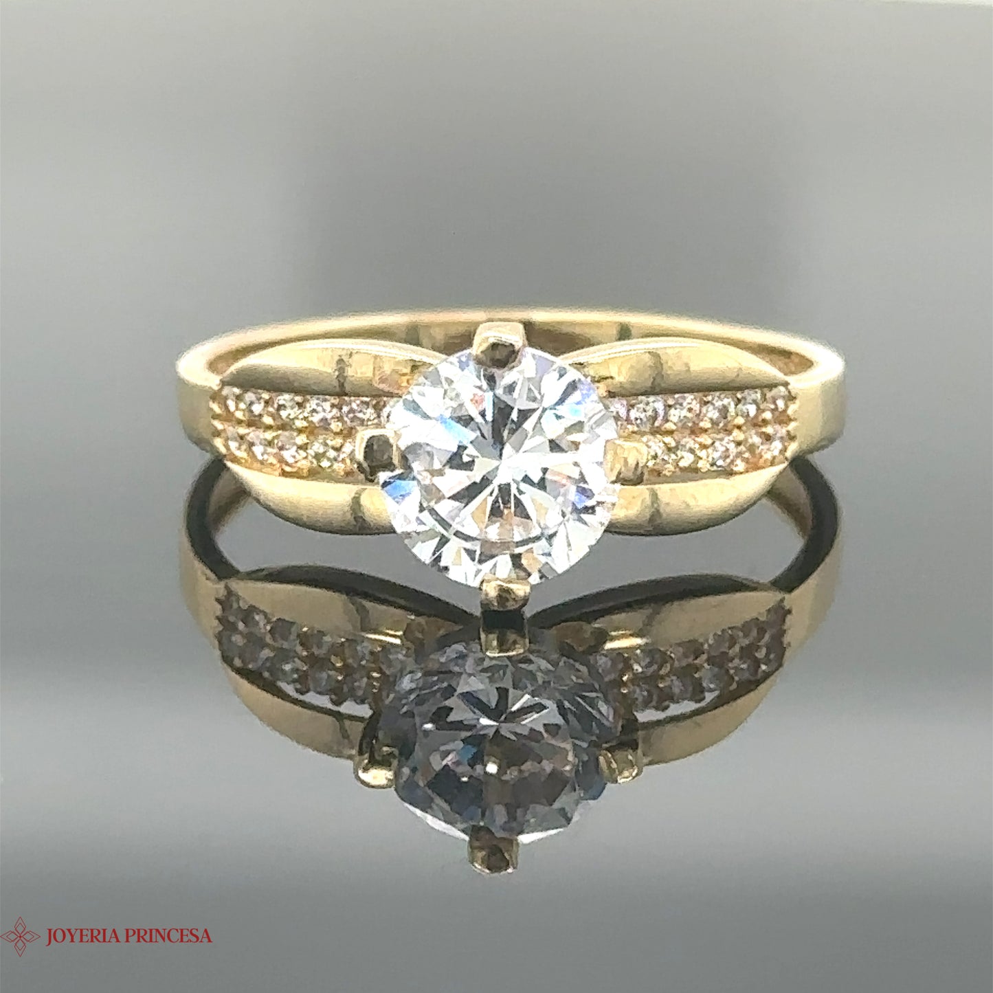 Anillo de compromiso con diseño de lazo de 14 quilates y circonita circular