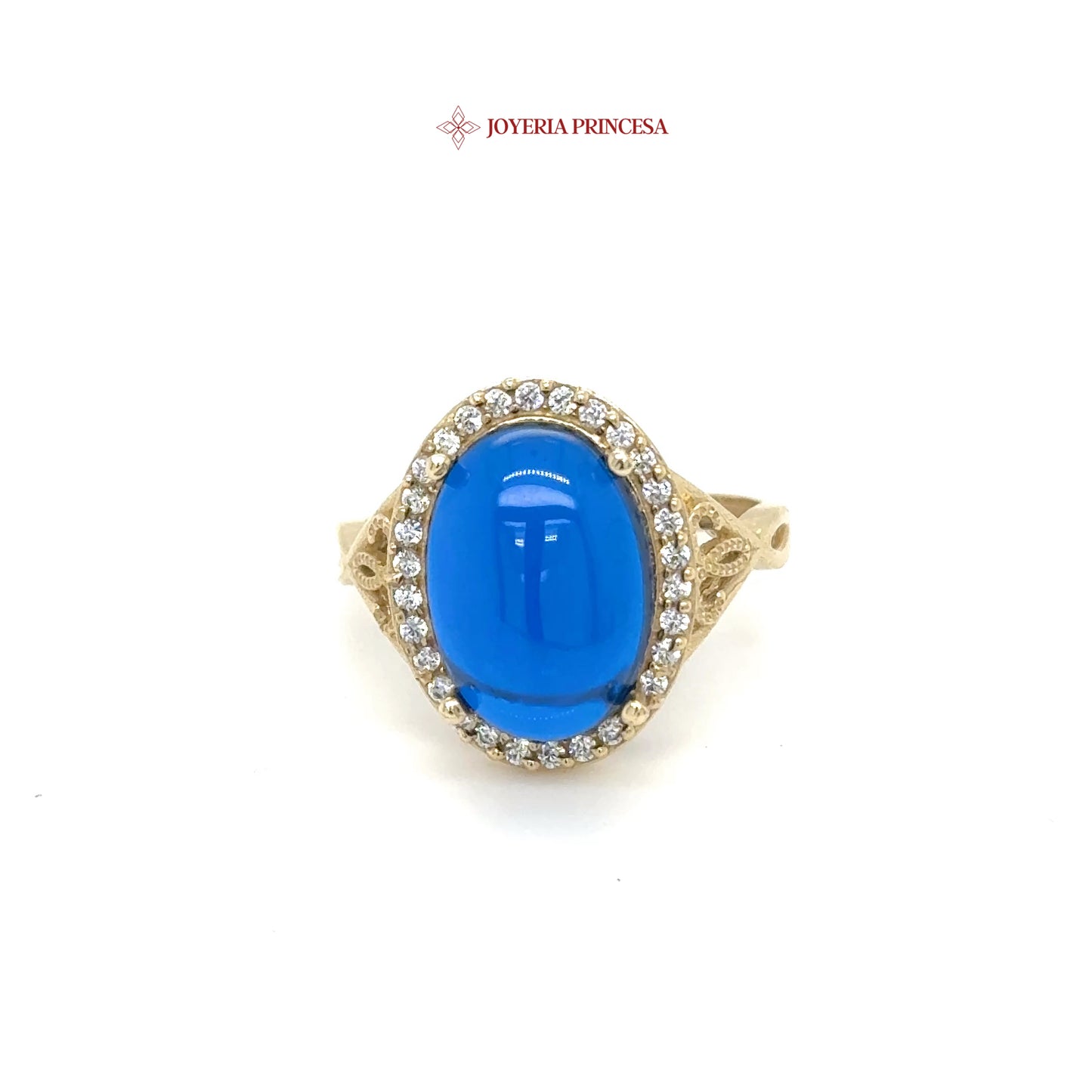 Anillo de oro de 14 quilates con cabujón azul y halo de circonitas