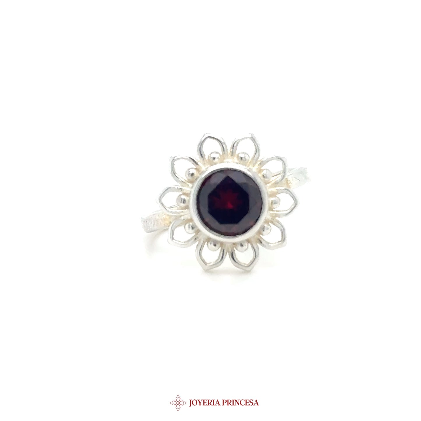 Silver Ring with Garnet Center and Floral Motif